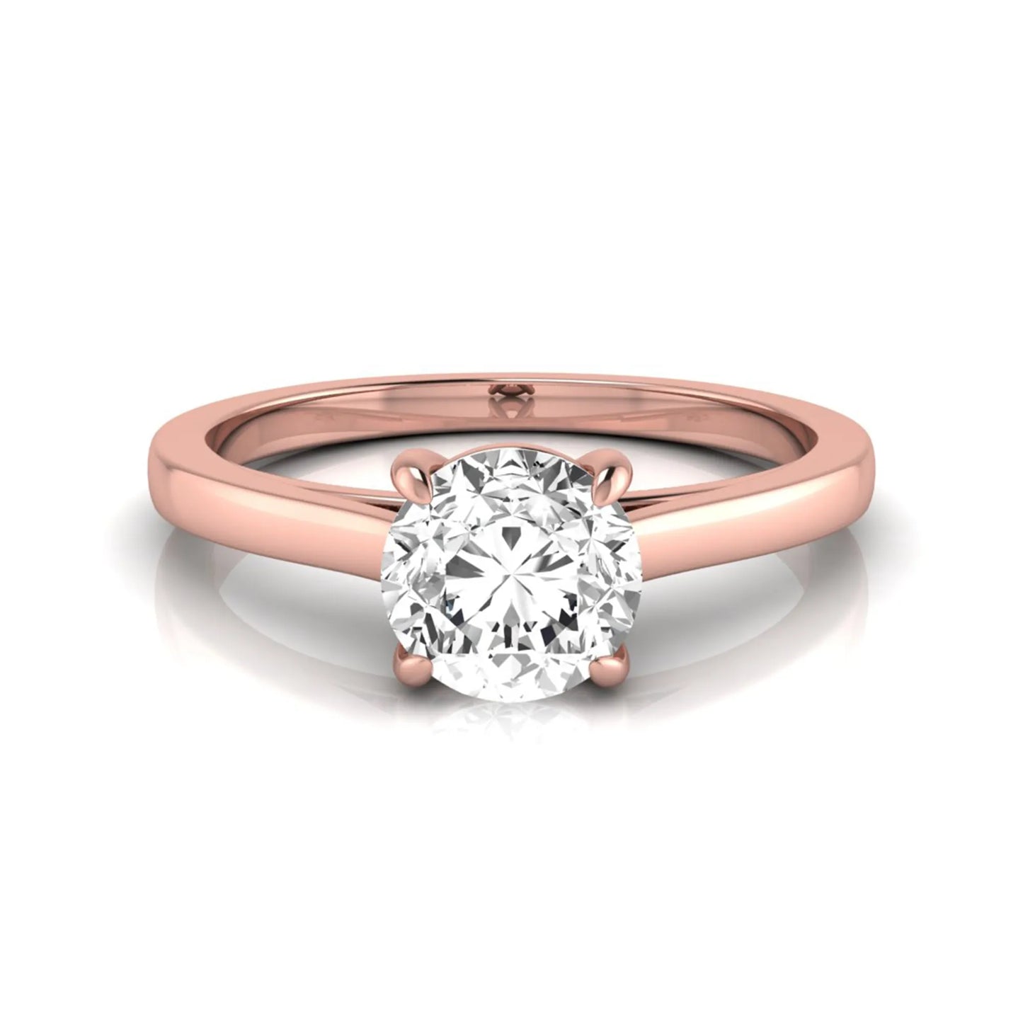 Round cut lab grown diamond solitaire engagement ring featuring an IGI certified center diamond in a classic four-prong setting with a slim polished band in rose gold