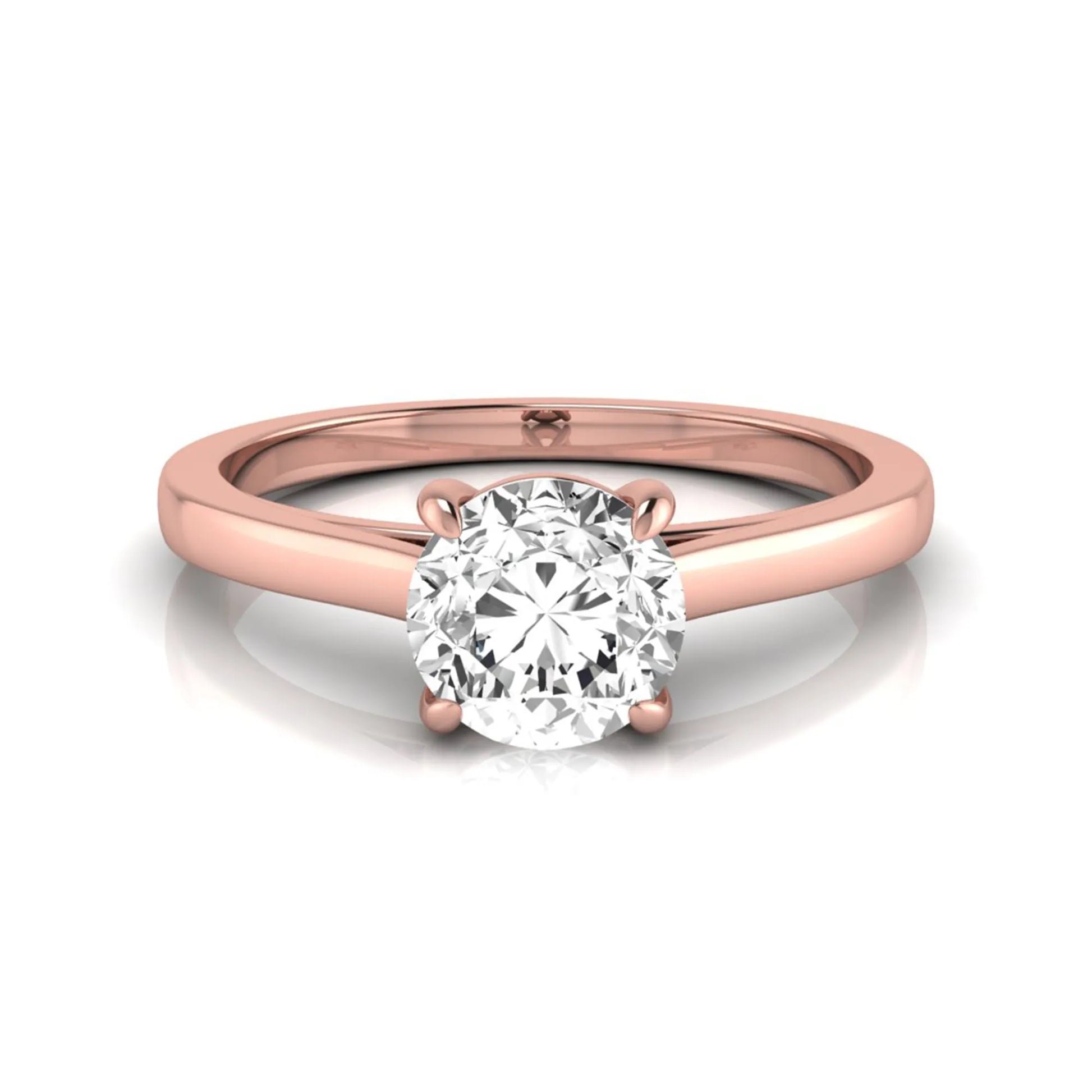 Round cut lab grown diamond solitaire engagement ring featuring an IGI certified center diamond in a classic four-prong setting with a slim polished band in rose gold