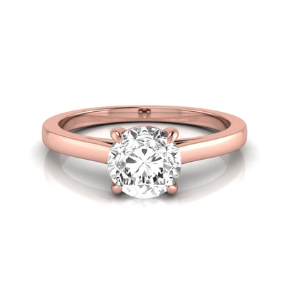 Round cut lab grown diamond solitaire engagement ring featuring an IGI certified center diamond in a classic four-prong setting with a slim polished band in rose gold