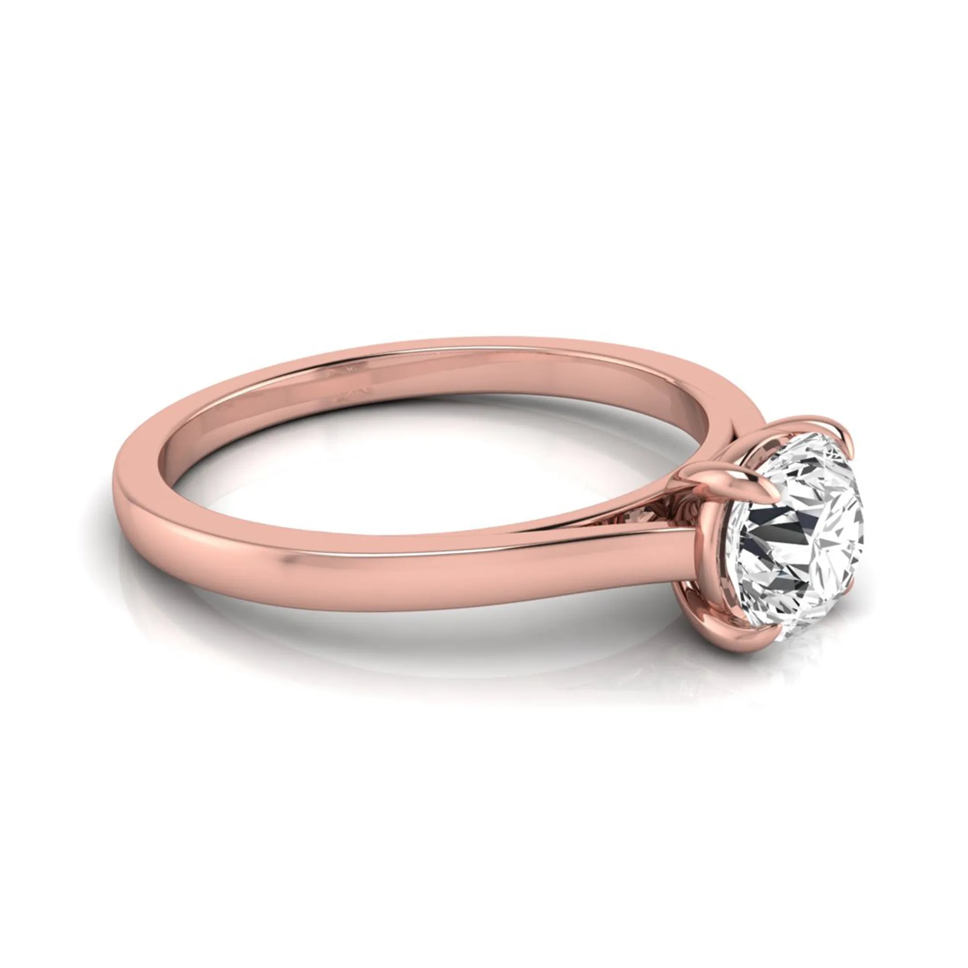 Round cut lab grown diamond solitaire engagement ring featuring an IGI certified center diamond in a classic four-prong setting with a slim polished band in rose gold