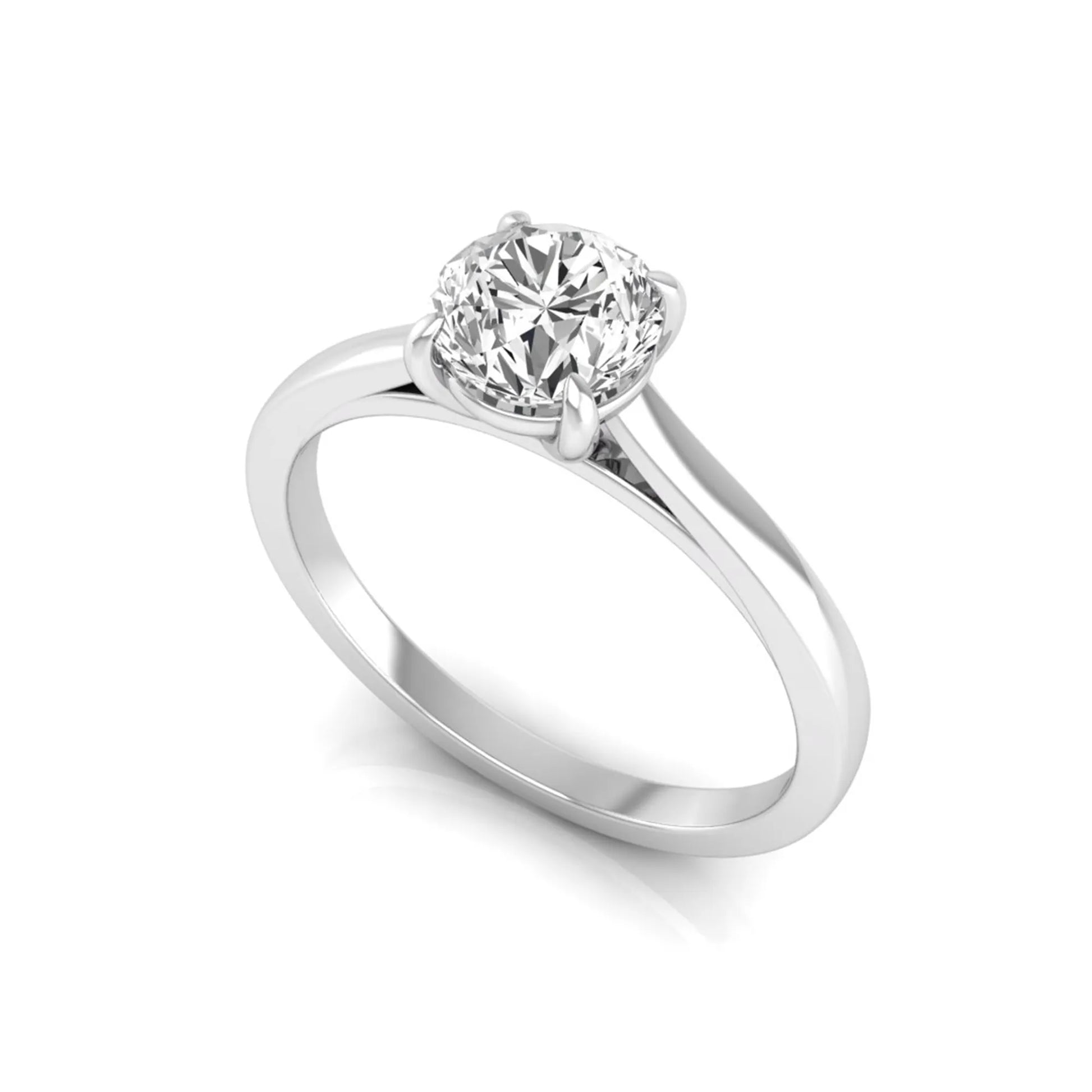 Round cut lab grown diamond solitaire engagement ring featuring an IGI certified center diamond in a classic four-prong setting with a slim polished band in white gold