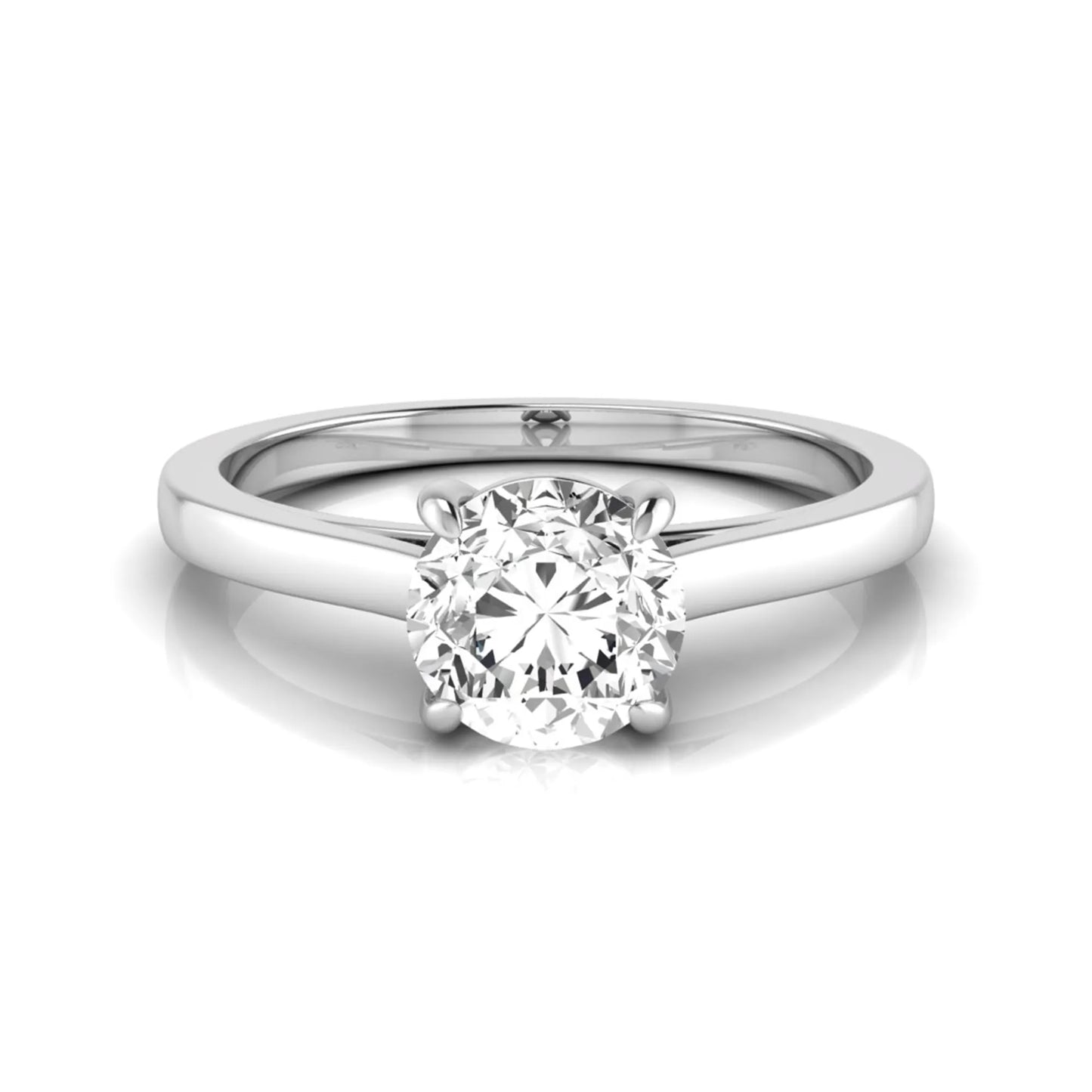 Round cut lab grown diamond solitaire engagement ring featuring an IGI certified center diamond in a classic four-prong setting with a slim polished band in white gold