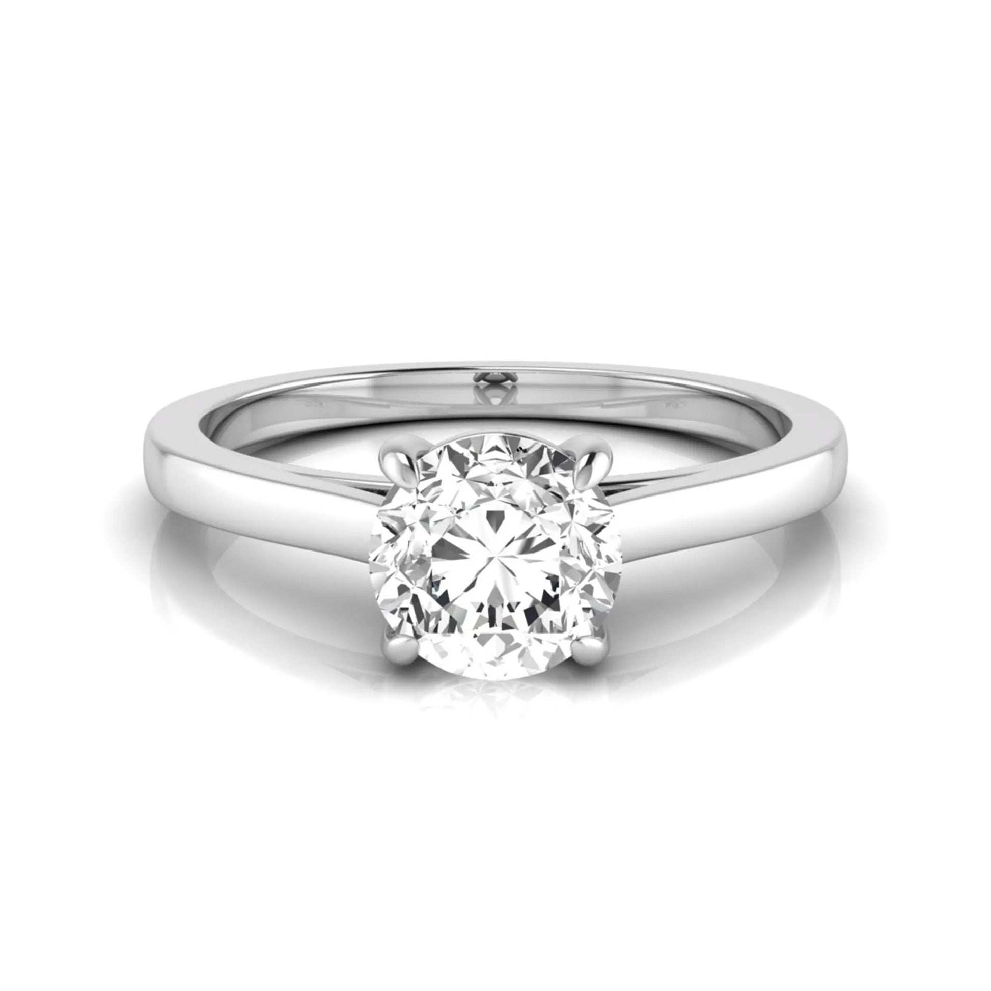 Round cut lab grown diamond solitaire engagement ring featuring an IGI certified center diamond in a classic four-prong setting with a slim polished band in white gold