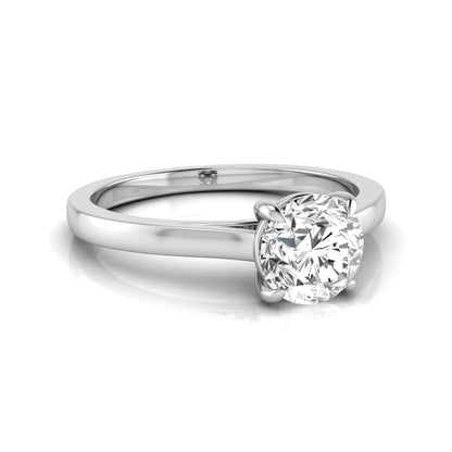 Round cut lab grown diamond solitaire engagement ring featuring an IGI certified center diamond in a classic four-prong setting with a slim polished band in white gold