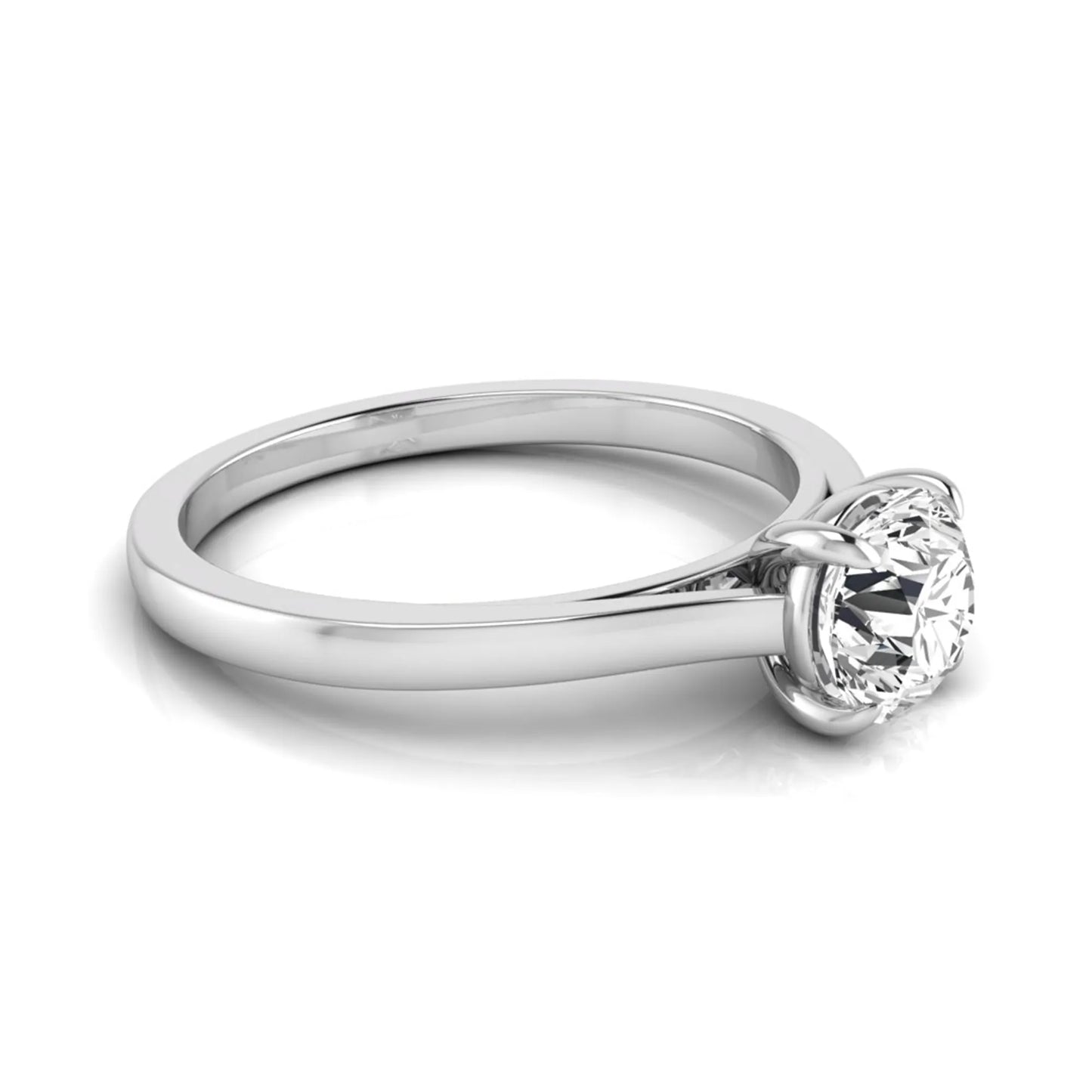 Round cut lab grown diamond solitaire engagement ring featuring an IGI certified center diamond in a classic four-prong setting with a slim polished band in white gold