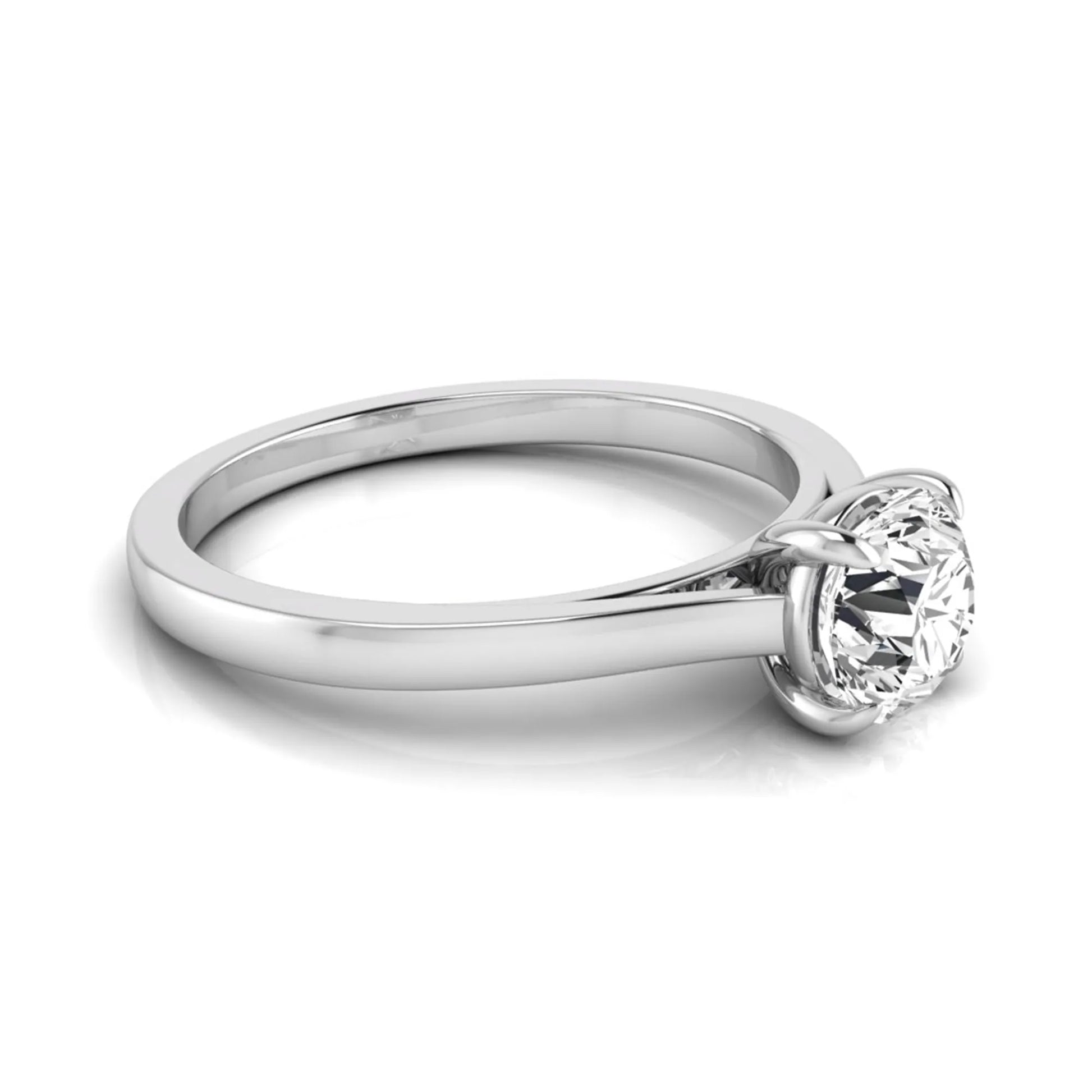 Round cut lab grown diamond solitaire engagement ring featuring an IGI certified center diamond in a classic four-prong setting with a slim polished band in white gold