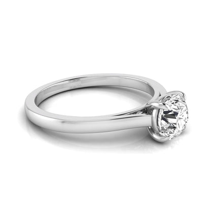 Round cut lab grown diamond solitaire engagement ring featuring an IGI certified center diamond in a classic four-prong setting with a slim polished band in white gold