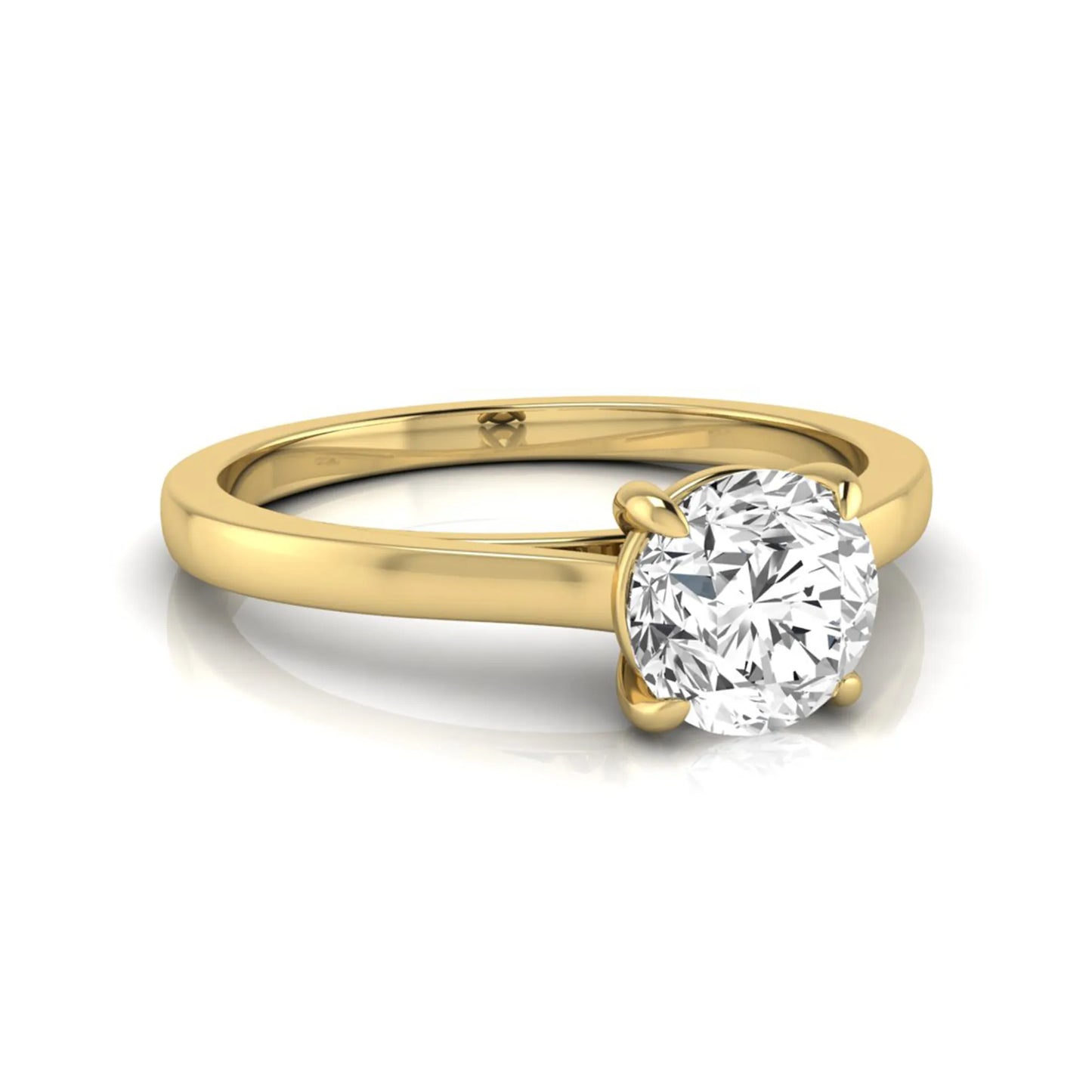 Round cut lab grown diamond solitaire engagement ring featuring an IGI certified center diamond in a classic four-prong setting with a slim polished band in yellow gold