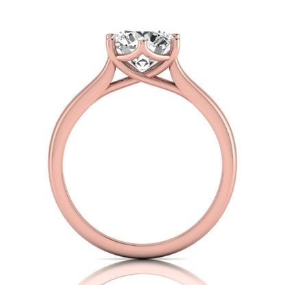 Round cut lab grown diamond solitaire engagement ring featuring an IGI certified center diamond in a classic six-prong cathedral setting in rose gold