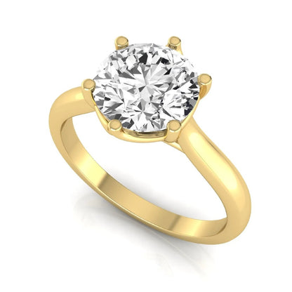 Round cut lab grown diamond solitaire engagement ring featuring an IGI certified center diamond in a classic six-prong cathedral setting in yellow gold