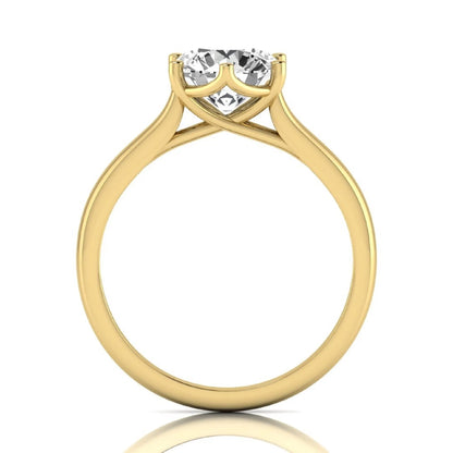 Round cut lab grown diamond solitaire engagement ring featuring an IGI certified center diamond in a classic six-prong cathedral setting in yellow gold