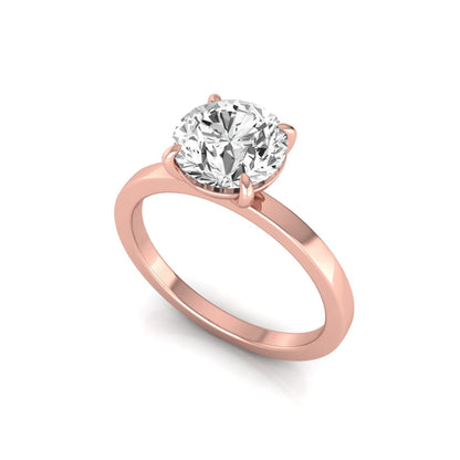 Round solitaire lab grown diamond engagement ring featuring a 2.07 carat IGI certified round brilliant diamond in a classic four-prong setting in rose gold