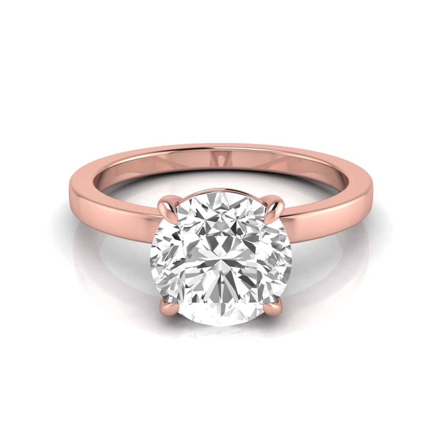 Round solitaire lab grown diamond engagement ring featuring a 2.07 carat IGI certified round brilliant diamond in a classic four-prong setting in rose gold