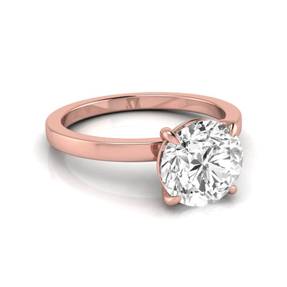 Round solitaire lab grown diamond engagement ring featuring a 2.07 carat IGI certified round brilliant diamond in a classic four-prong setting in rose gold