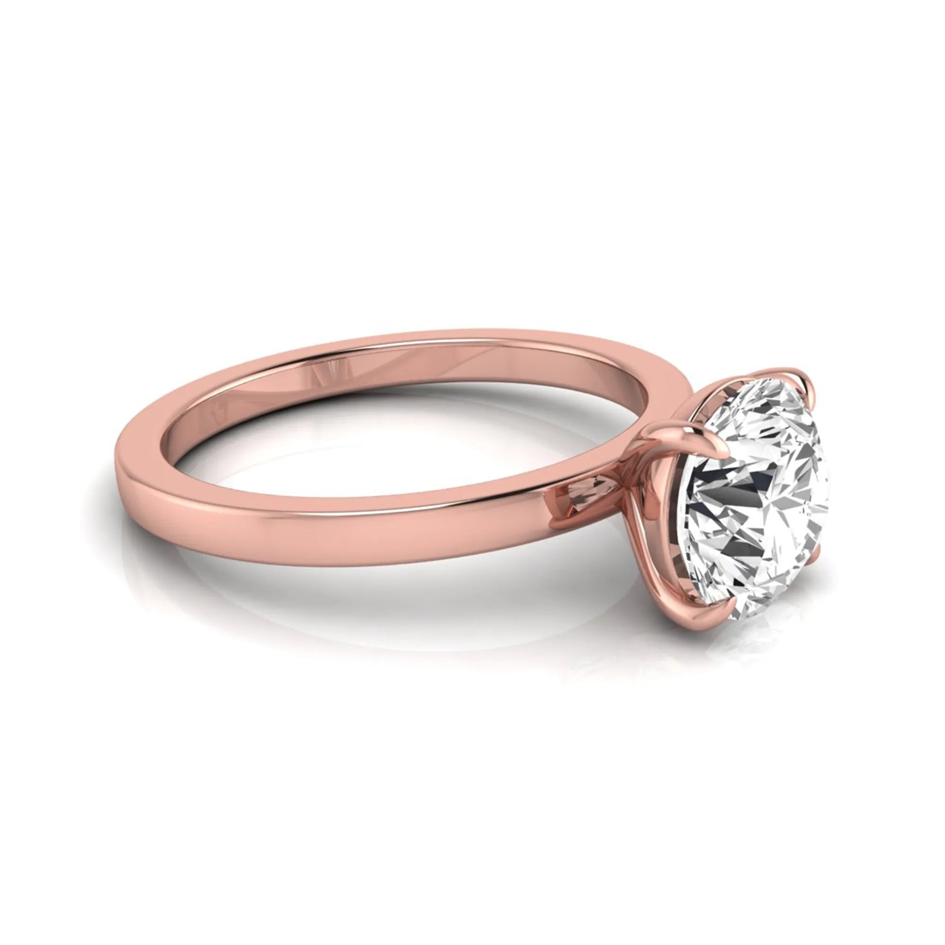 Round solitaire lab grown diamond engagement ring featuring a 2.07 carat IGI certified round brilliant diamond in a classic four-prong setting in rose gold