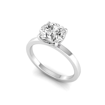 Round solitaire lab grown diamond engagement ring featuring a 2.07 carat IGI certified round brilliant diamond in a classic four-prong setting in white gold