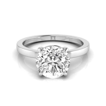 Round solitaire lab grown diamond engagement ring featuring a 2.07 carat IGI certified round brilliant diamond in a classic four-prong setting in white gold