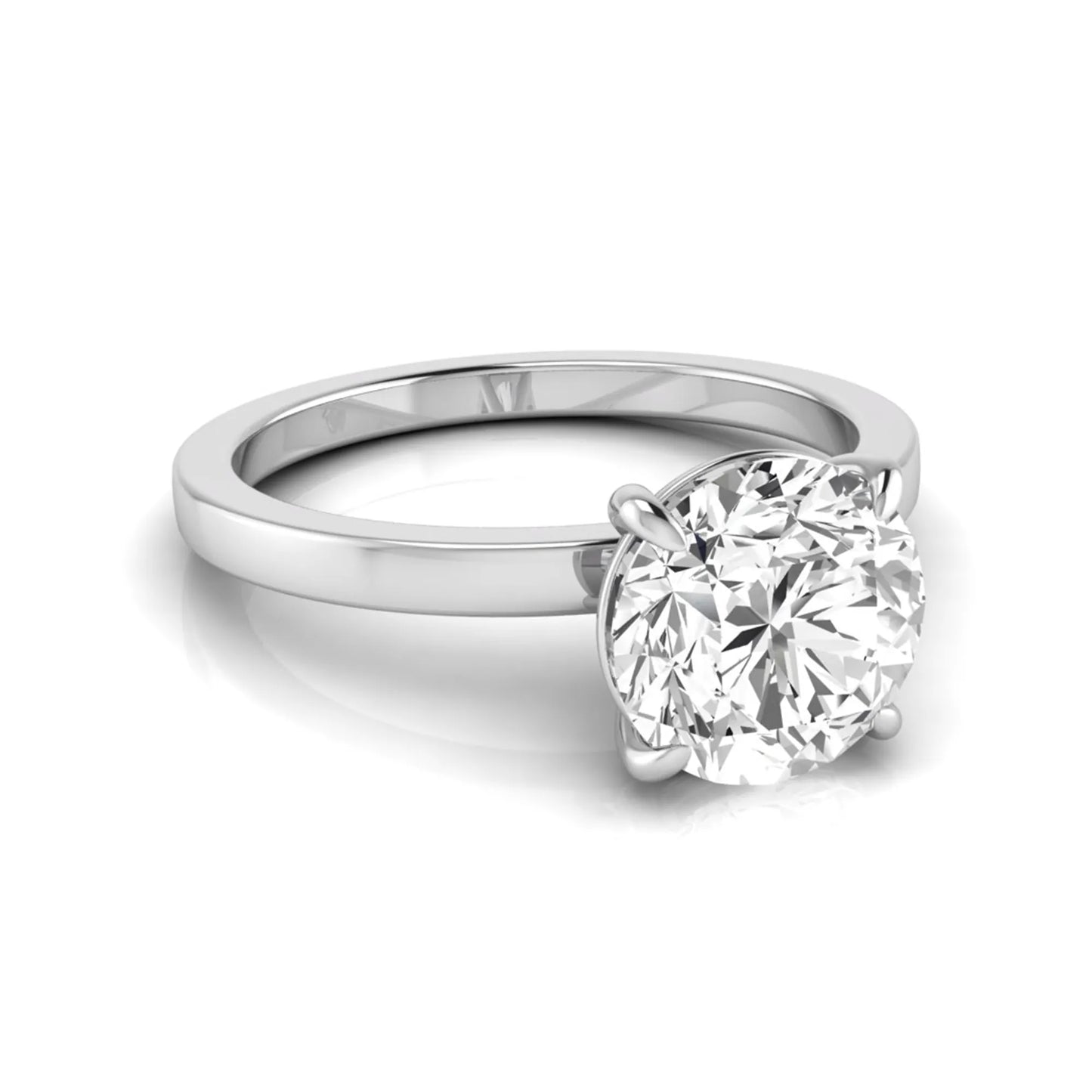 Round solitaire lab grown diamond engagement ring featuring a 2.07 carat IGI certified round brilliant diamond in a classic four-prong setting in white gold