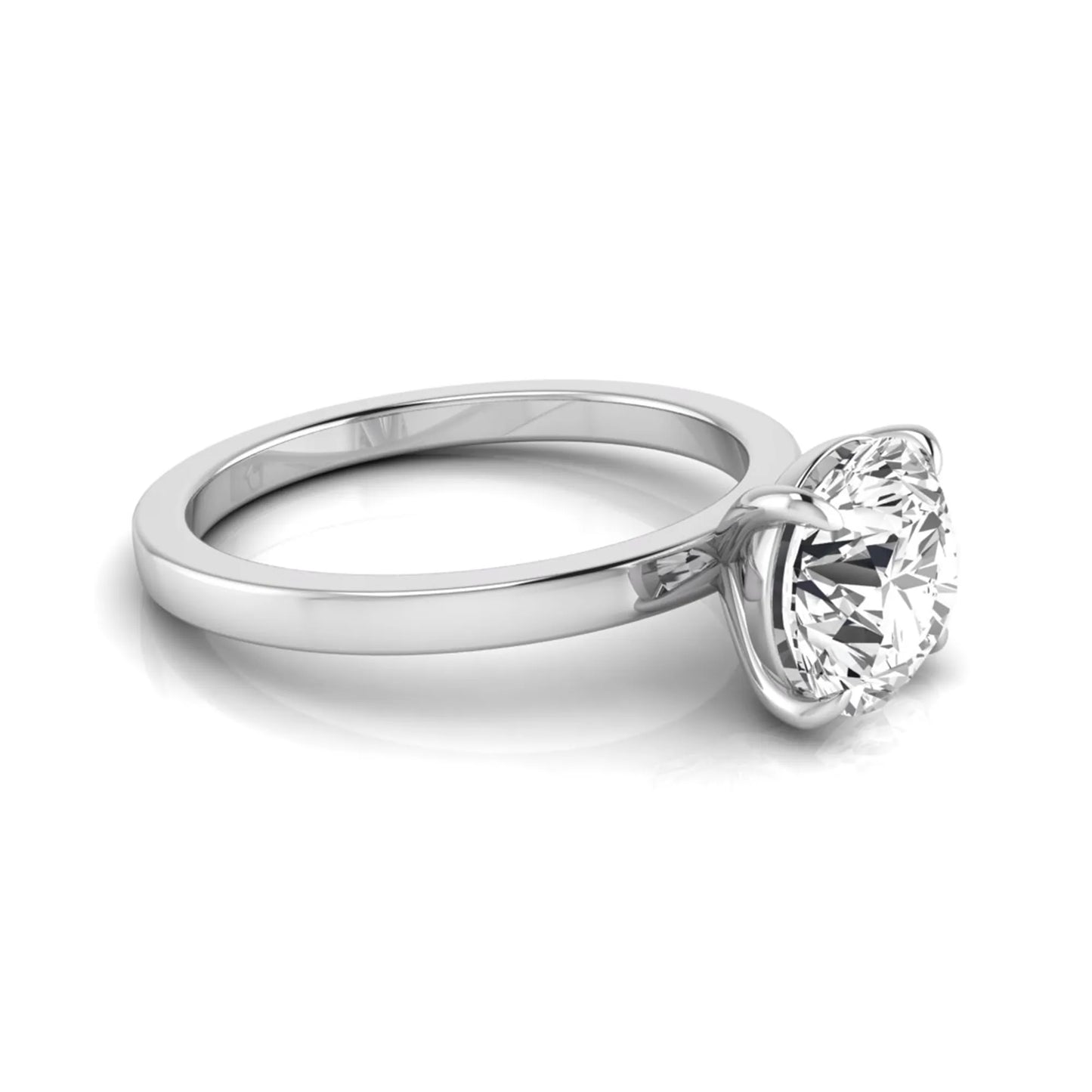 Round solitaire lab grown diamond engagement ring featuring a 2.07 carat IGI certified round brilliant diamond in a classic four-prong setting in white gold