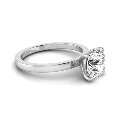 Round solitaire lab grown diamond engagement ring featuring a 2.07 carat IGI certified round brilliant diamond in a classic four-prong setting in white gold