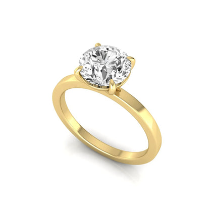 Round solitaire lab grown diamond engagement ring featuring a 2.07 carat IGI certified round brilliant diamond in a classic four-prong setting in yellow gold
