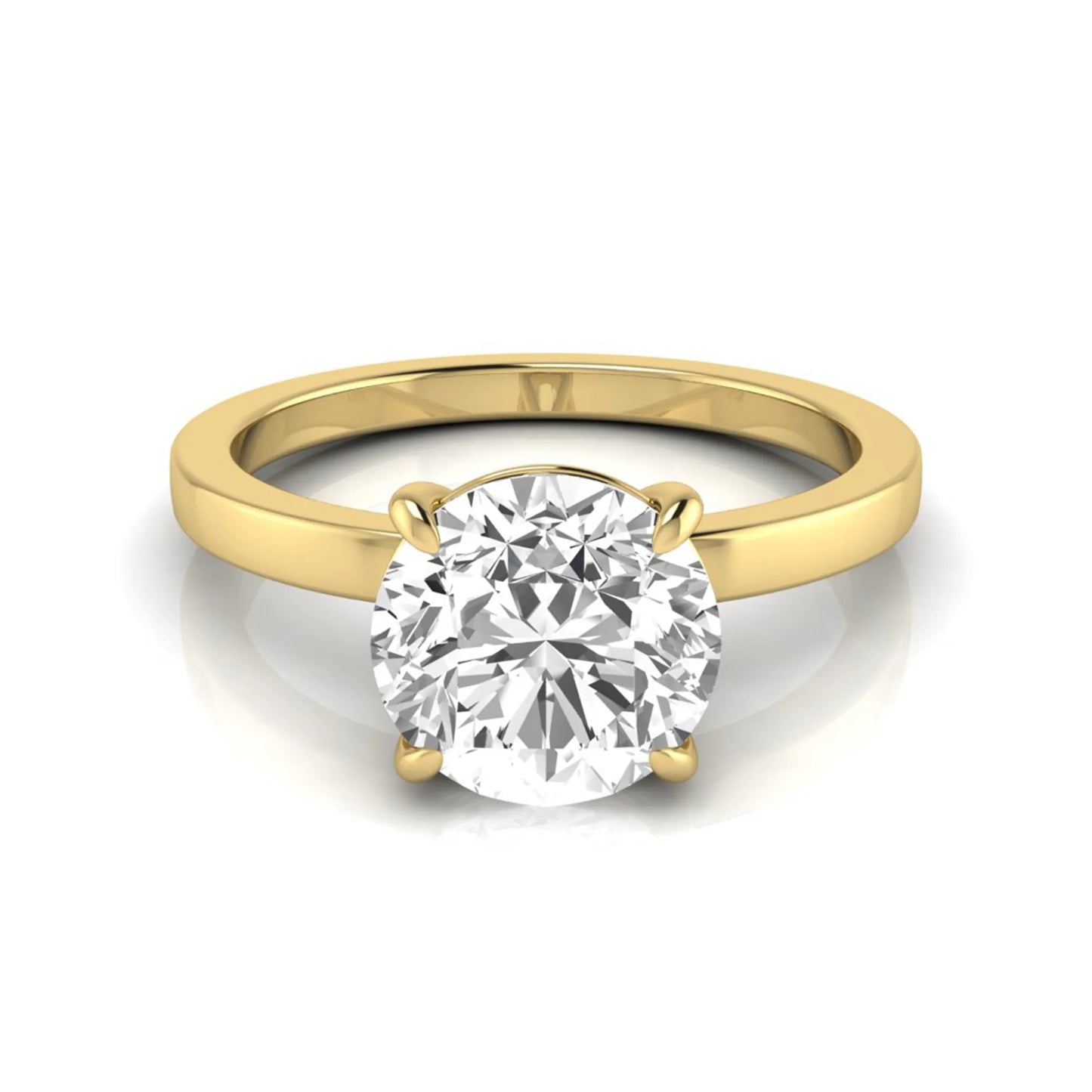 Round solitaire lab grown diamond engagement ring featuring a 2.07 carat IGI certified round brilliant diamond in a classic four-prong setting in yellow gold