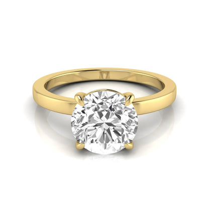 Round solitaire lab grown diamond engagement ring featuring a 2.07 carat IGI certified round brilliant diamond in a classic four-prong setting in yellow gold