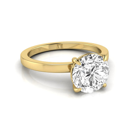 Round solitaire lab grown diamond engagement ring featuring a 2.07 carat IGI certified round brilliant diamond in a classic four-prong setting in yellow gold