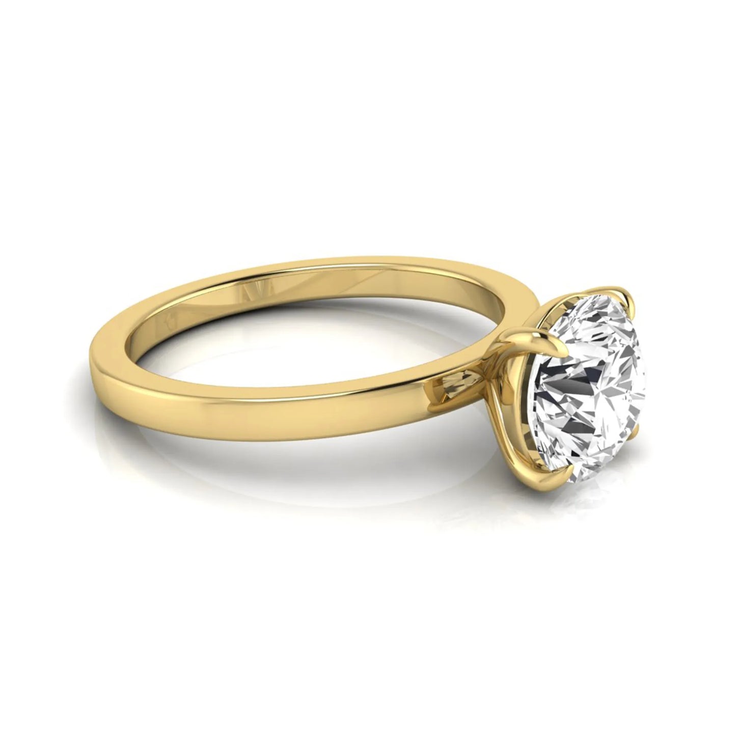 Round solitaire lab grown diamond engagement ring featuring a 2.07 carat IGI certified round brilliant diamond in a classic four-prong setting in yellow gold