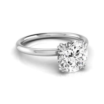 Round cut lab grown diamond solitaire engagement ring with six-prong setting in white gold style.
