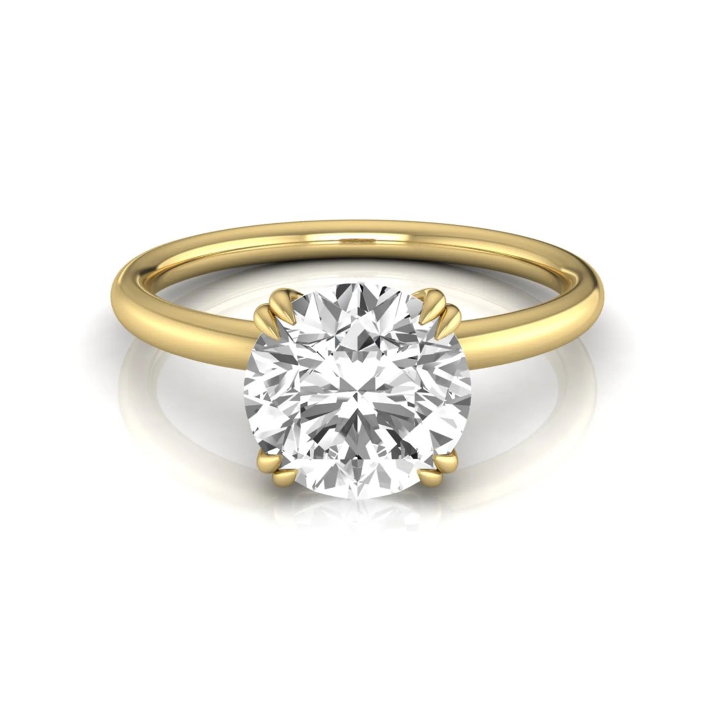 Round cut lab grown diamond solitaire engagement ring with six-prong setting in yellow gold style.