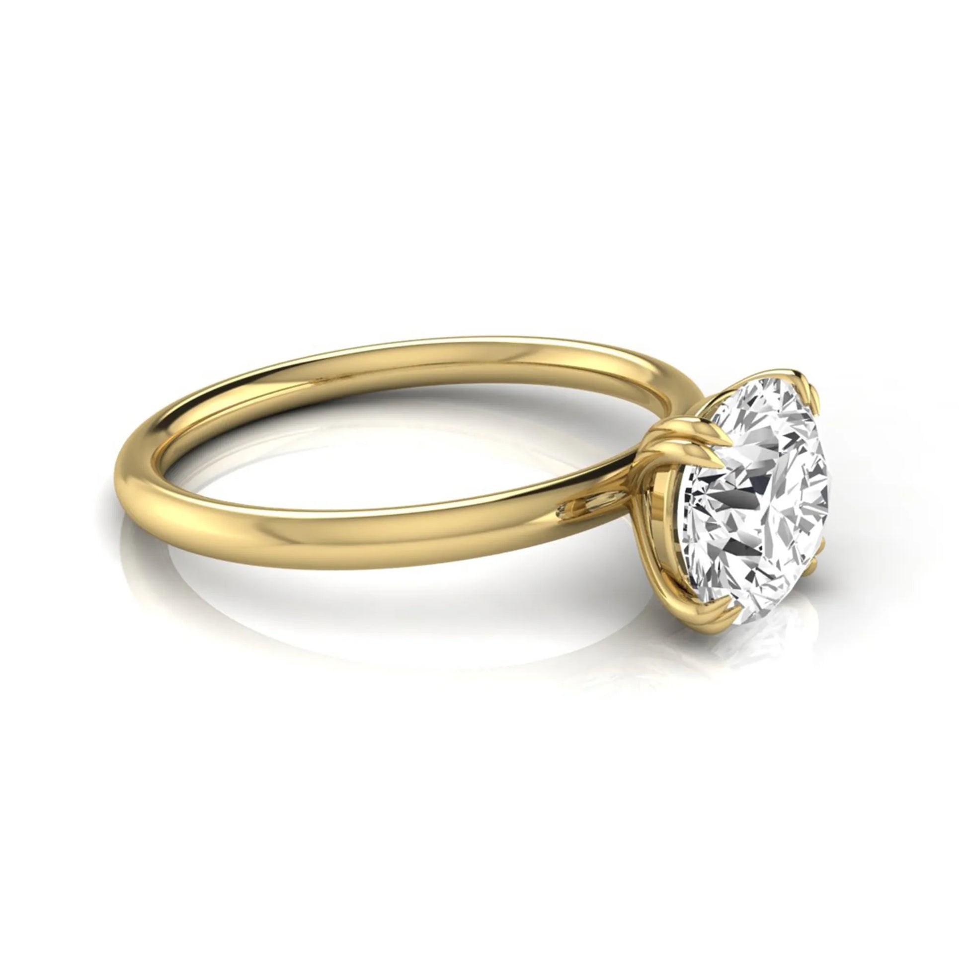 Round cut lab grown diamond solitaire engagement ring with six-prong setting in yellow gold style.