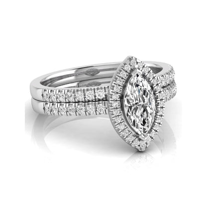 Marquise cut lab grown diamond halo bridal ring set with round diamond pavé band in white gold design.