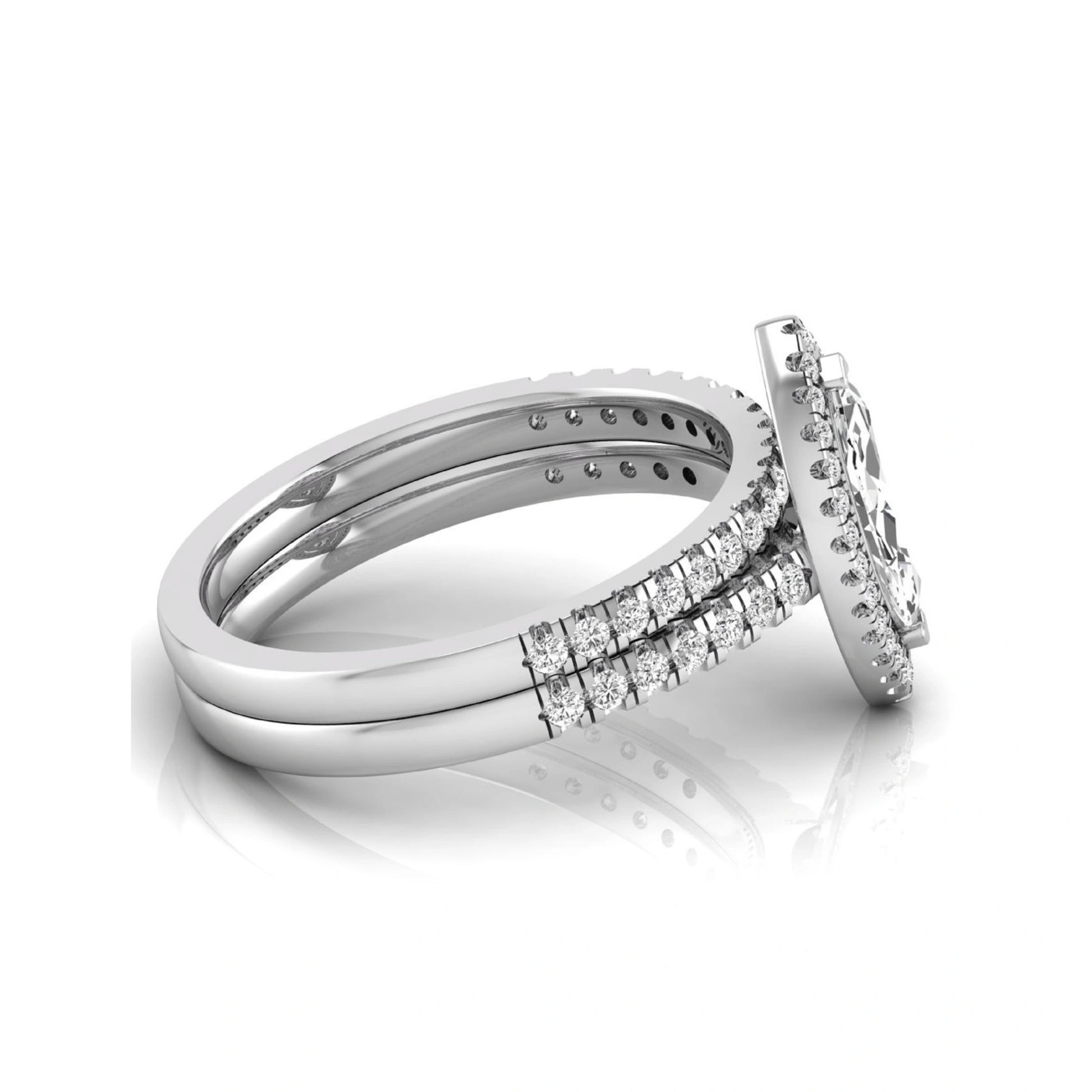 Marquise cut lab grown diamond halo bridal ring set with round diamond pavé band in white gold design.