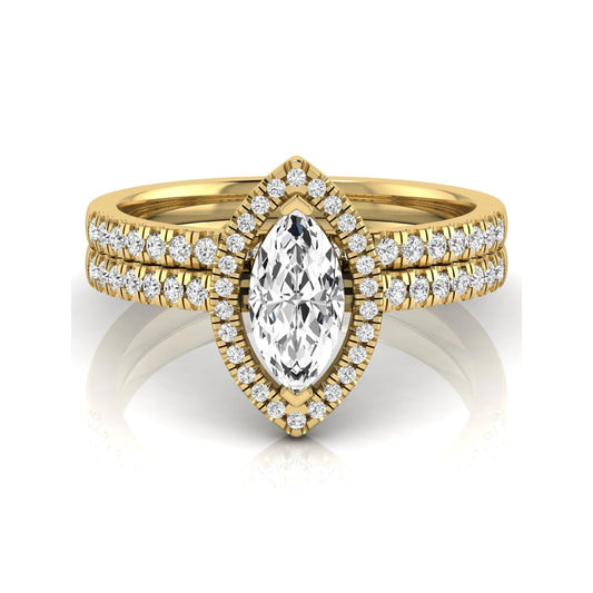 Marquise cut lab grown diamond halo bridal ring set with round diamond pavé band in yellow gold design.