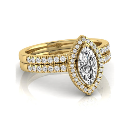 Marquise cut lab grown diamond halo bridal ring set with round diamond pavé band in yellow gold design.