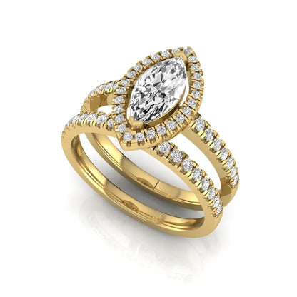 Marquise cut lab grown diamond halo bridal ring set with round diamond pavé band in yellow gold design.