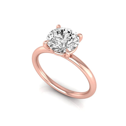 Round cut lab grown diamond engagement ring featuring a 2.04 carat center diamond in a classic four-prong solitaire setting with a polished rose gold band.