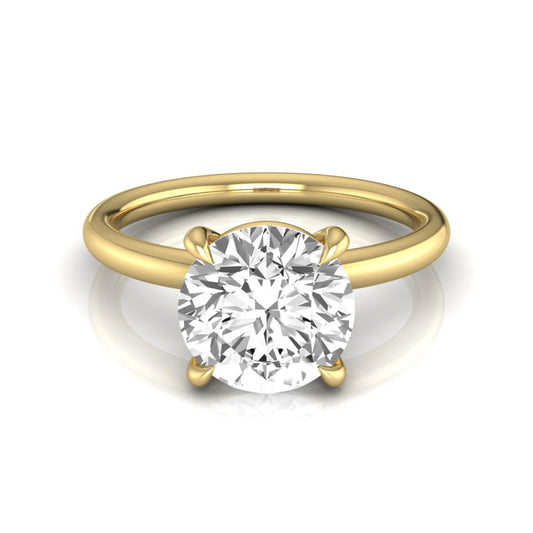 Round cut lab grown diamond engagement ring featuring a 2.04 carat center diamond in a classic four-prong solitaire setting with a polished yellow gold band.