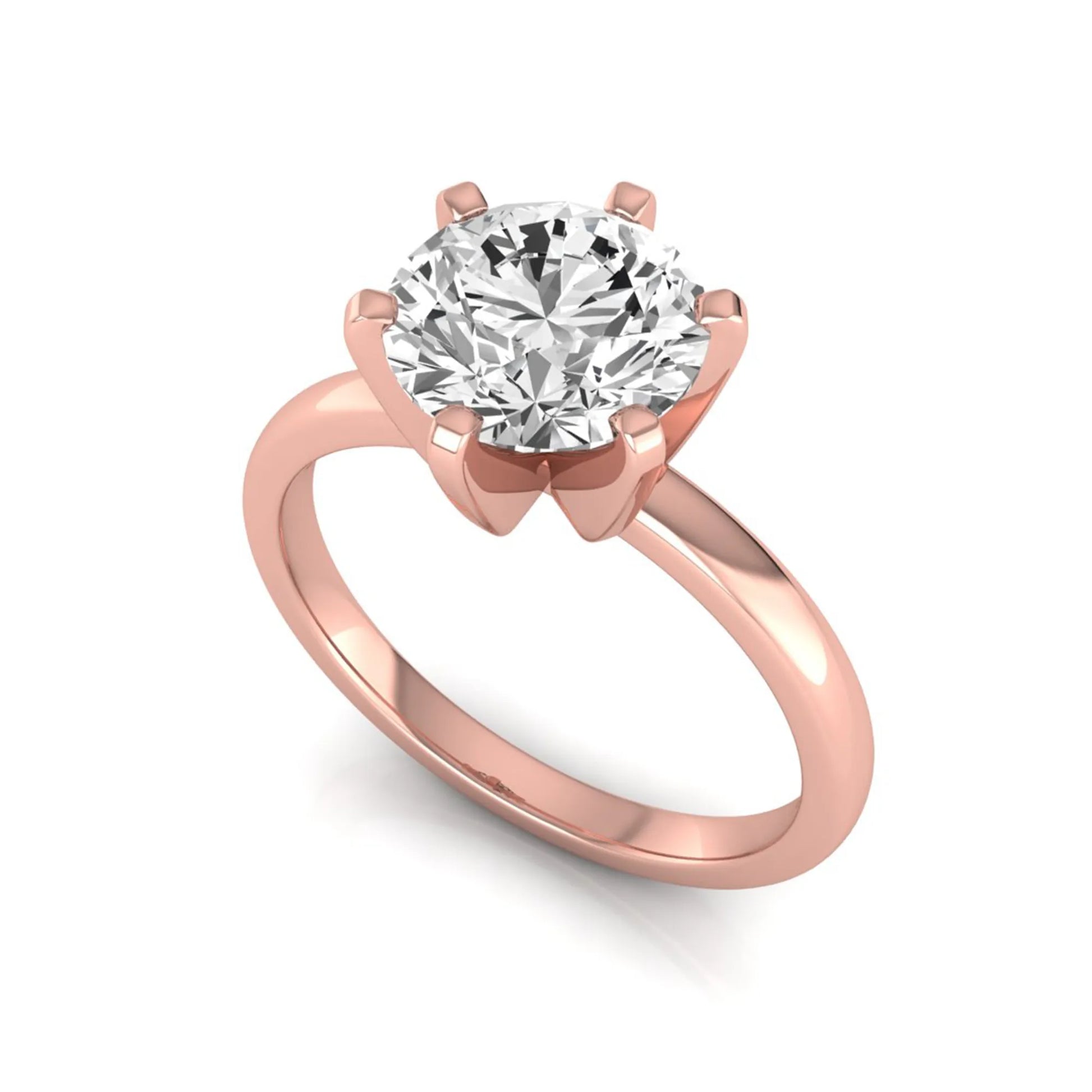 Round cut lab grown diamond solitaire engagement ring with six prong setting and rose gold metal tone.