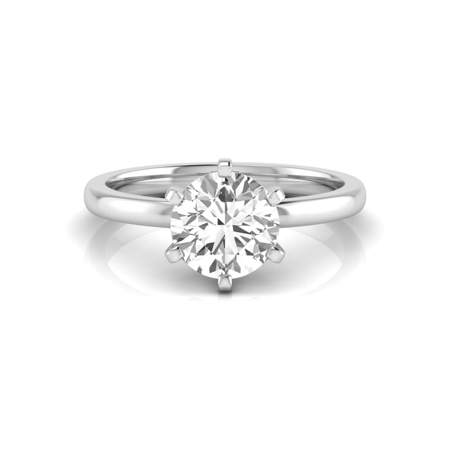 Round cut lab grown diamond solitaire engagement ring with six prong setting and white gold metal tone.
