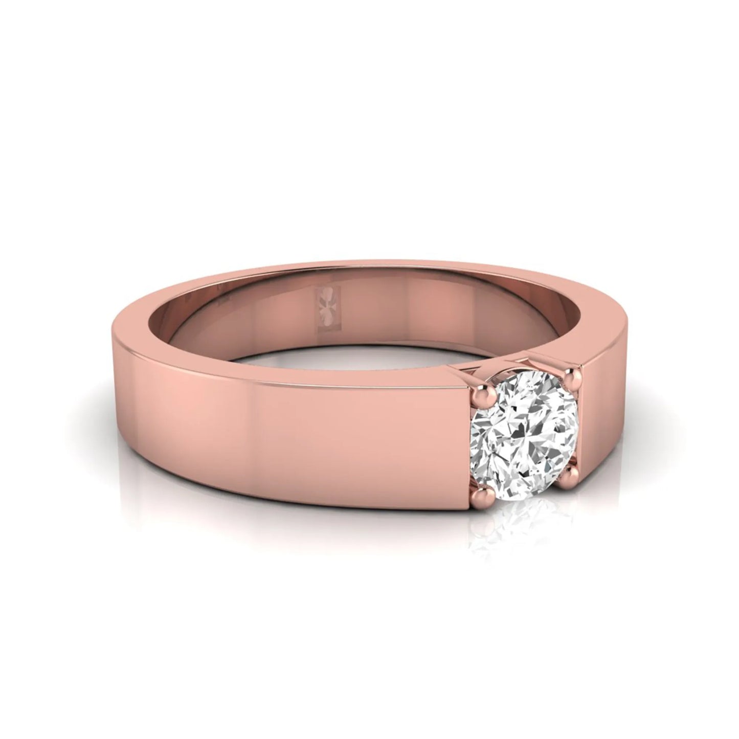 Round cut lab grown diamond solitaire ring featuring a modern flat polished band with a four-prong setting in rose gold tone.