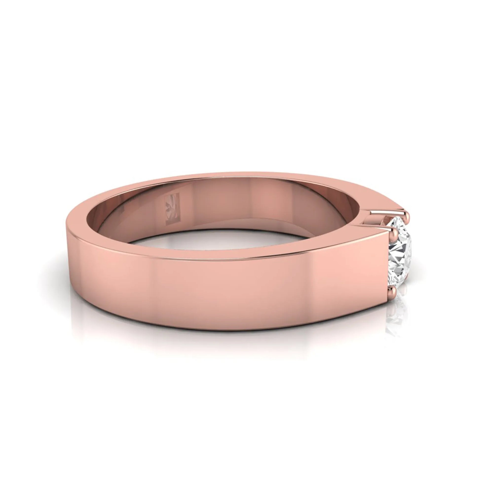 Round cut lab grown diamond solitaire ring featuring a modern flat polished band with a four-prong setting in rose gold tone.