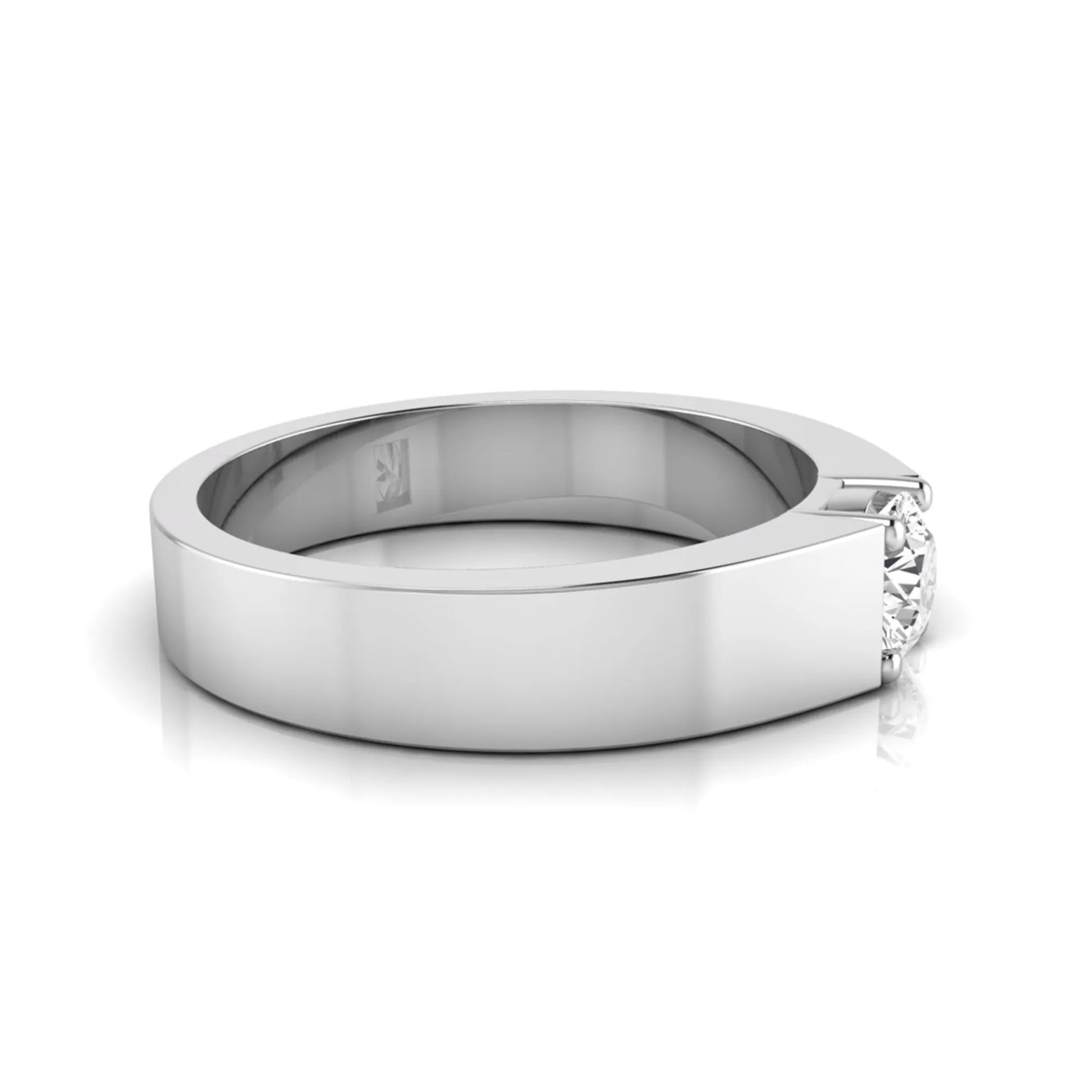Round cut lab grown diamond solitaire ring featuring a modern flat polished band with a four-prong setting in white gold tone.