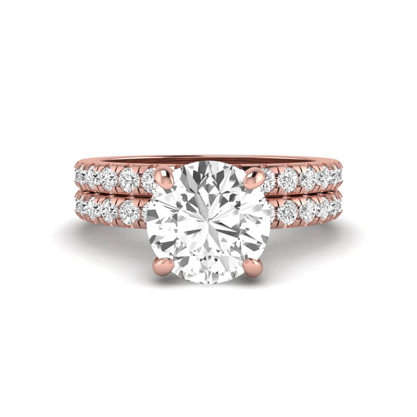 Round cut lab grown diamond solitaire bridal ring set featuring pavé diamond bands in a rose gold tone design.