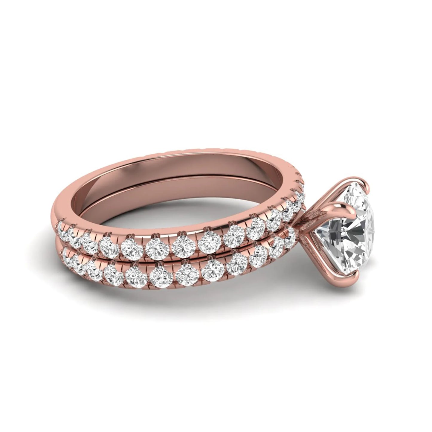 Round cut lab grown diamond solitaire bridal ring set featuring pavé diamond bands in a rose gold tone design.