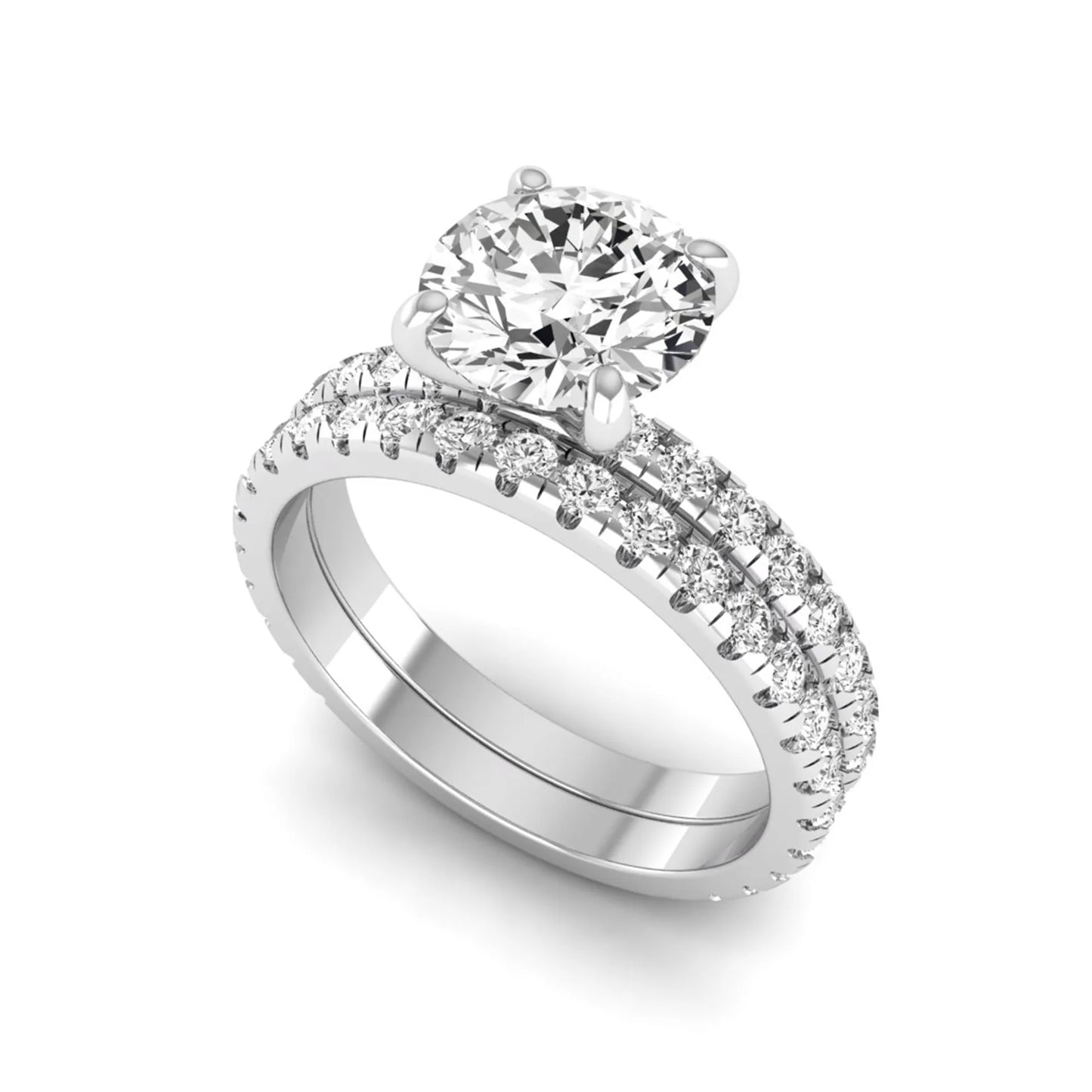 Round cut lab grown diamond solitaire bridal ring set featuring pavé diamond bands in a white gold tone design.
