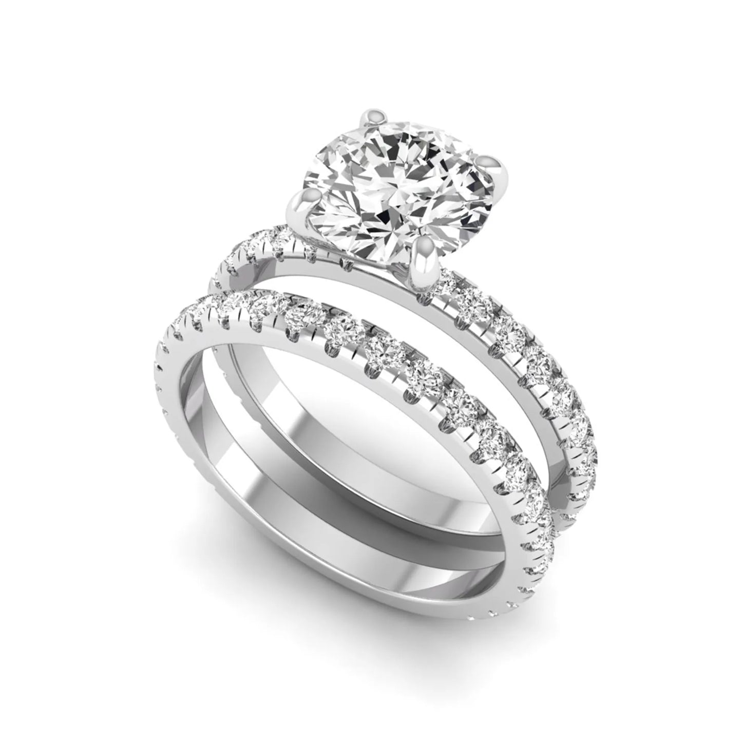 Round cut lab grown diamond solitaire bridal ring set featuring pavé diamond bands in a white gold tone design.