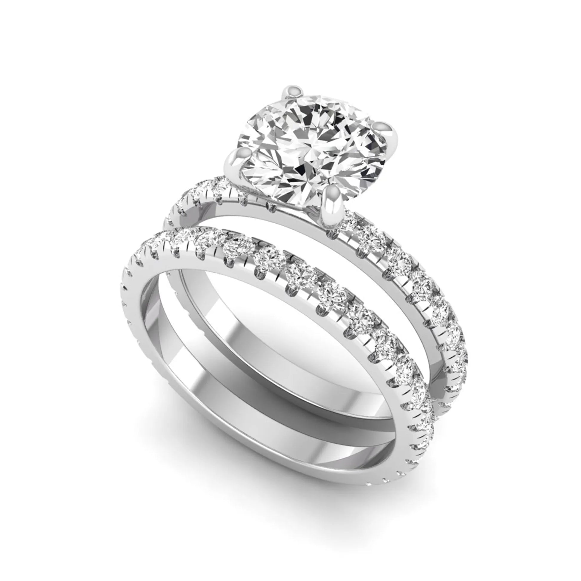 Round cut lab grown diamond solitaire bridal ring set featuring pavé diamond bands in a white gold tone design.
