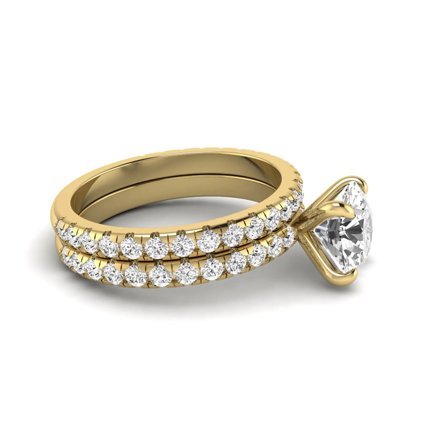 Round cut lab grown diamond solitaire bridal ring set featuring pavé diamond bands in a yellow gold tone design.